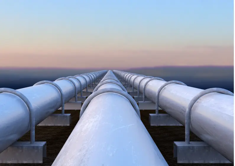 Coated steel pipelines running on concrete supports
